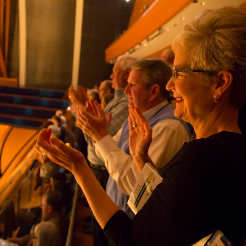 audience clapping at theatre