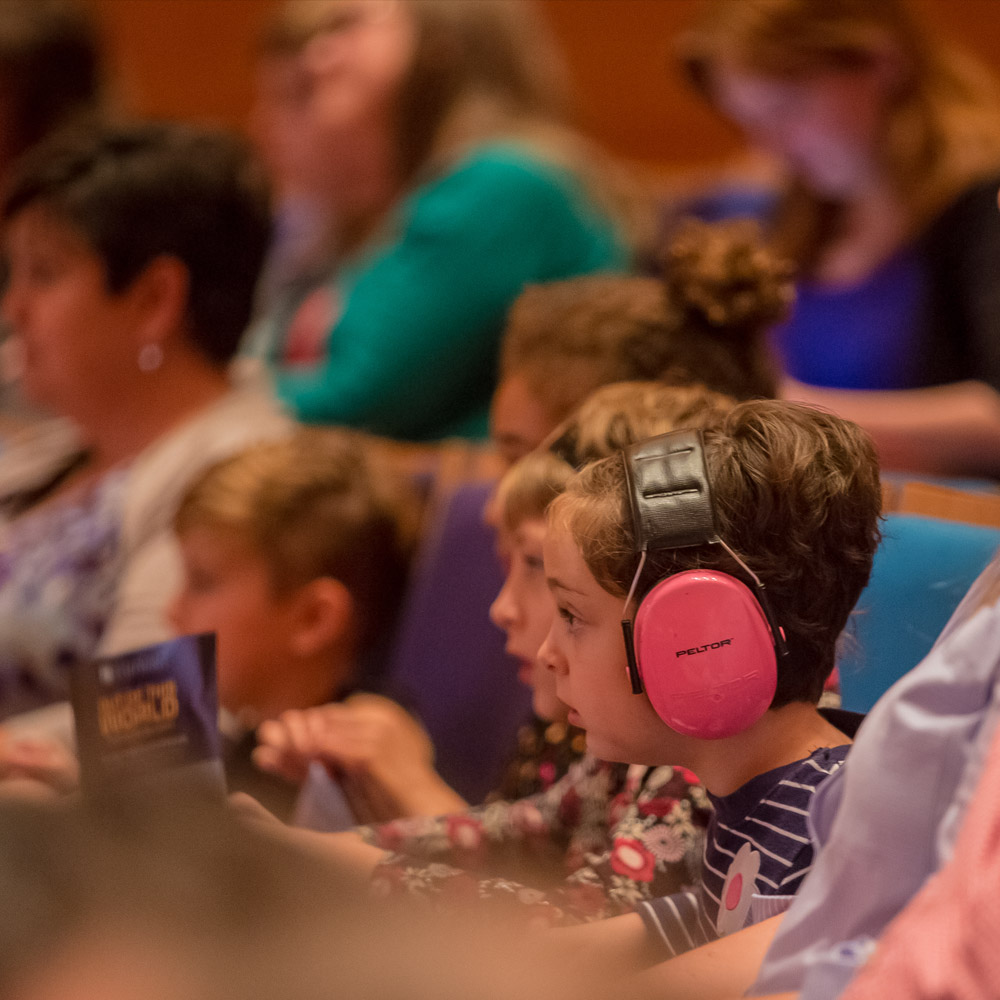 child at sensory friendly performance