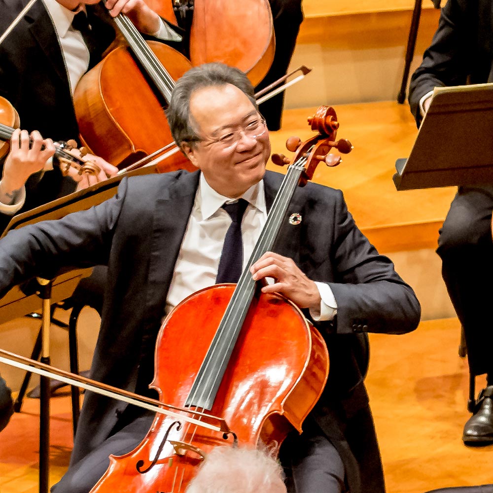 Cellist Yo-Yo Ma smiles while performing with the Kansas City Symphony